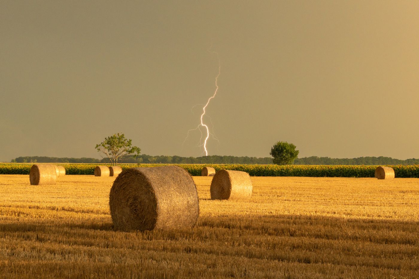 Lightning strike over farmland, a common cause of emergency well pump failures